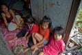 A mother and her children living in a slum.